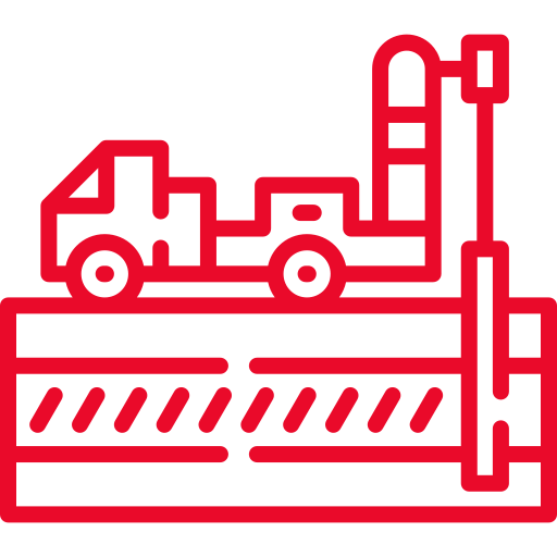 Red line drawing of a road construction vehicle working on a road, with a barrier and road markings shown in the foreground. The style is simple and uses bold outlines.